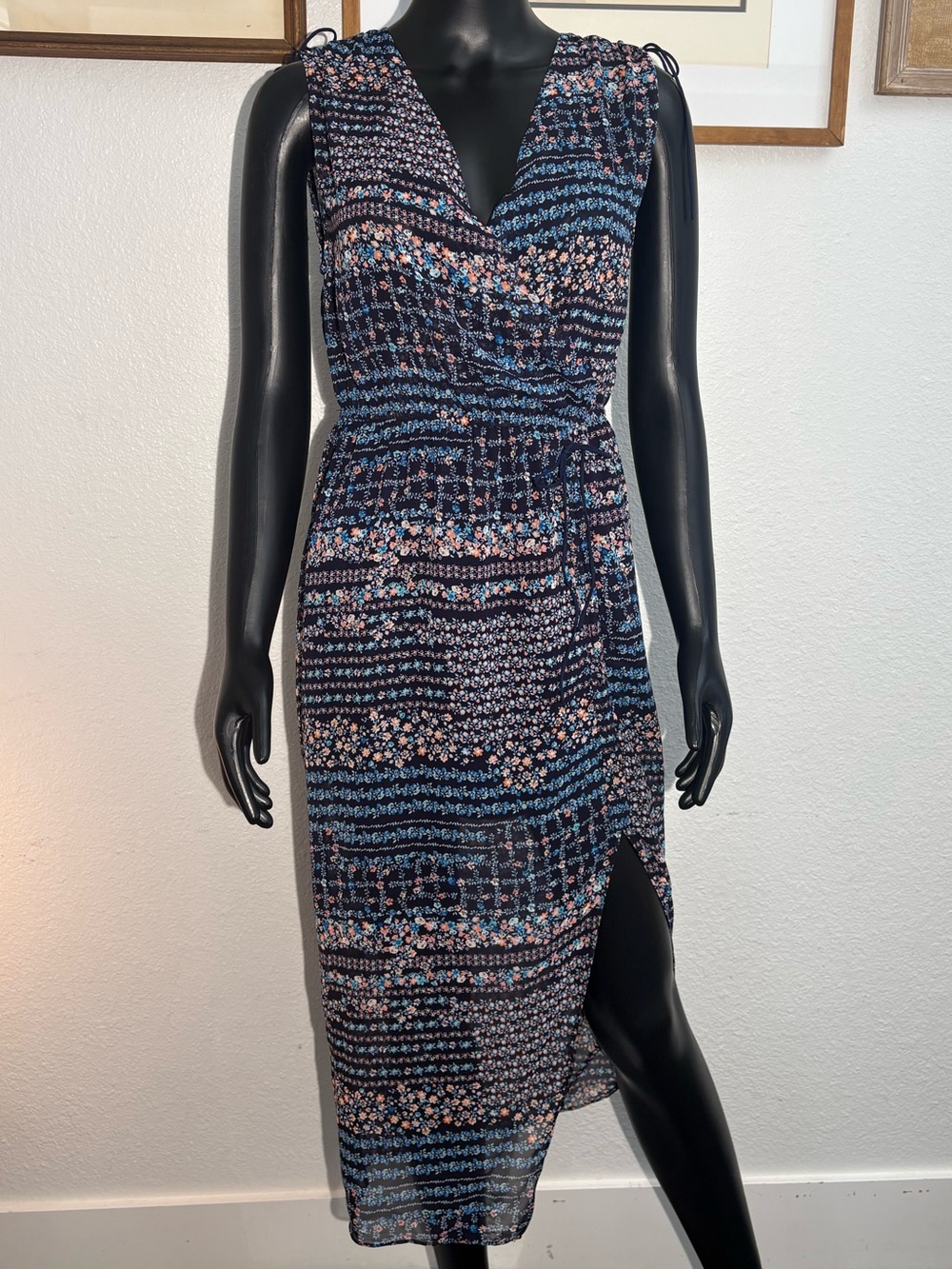 William B sleeveless midi dress with a multi-colored floral and geometric print